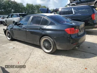 2015 BMW 3 Series 328i xDrive with VIN WBA3B5C59FP653564, listed as a Copart auction lot 64702115 with 92,821 mi miles and Salvage title. Bid and sale history available at DreamBid. Image 2.