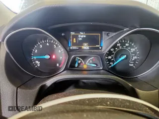 2018 Ford Focus SE with VIN 1FADP3FE0JL311760, listed as a Copart auction lot 63621755 with 81,000 mi miles and Salvage title. Bid and sale history available at DreamBid. Image 9.