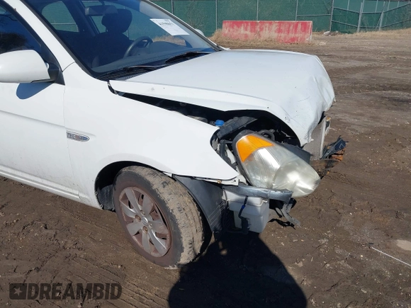 2008 Hyundai Accent GS with VIN KMHCM36C68U055850, listed as a IAAI auction lot 41590651 with 198,827 mi miles. Bid and sale history available at carsss.com. Image 13.
