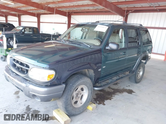 1999 Ford Explorer XLT z VIN 1FMZU34E5XZB99275, wystawiony jako IAAI lot #42293675 z przebiegiem 249 541 mil mil oraz . Historia ofert i sprzedaży dostępna na DreamBid. Obrazek 2.