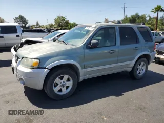 2005 Ford Escape Hybrid z VIN 1FMCU95H75KE10614, wystawiony jako Copart lot #58187155 z przebiegiem 190 373 mil mil oraz Czysty tytuł • Clean title. Historia ofert i sprzedaży dostępna na DreamBid. Obrazek 1.