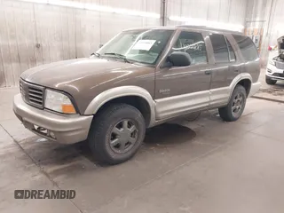 2001 Oldsmobile Bravada z VIN 1GHDT13W812133670, wystawiony jako IAAI lot #42224085 z przebiegiem 159 995 mil mil oraz . Historia ofert i sprzedaży dostępna na DreamBid. Obrazek 2.