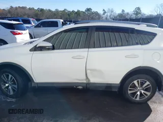 2018 Toyota RAV4 XLE with VIN JTMWFREV7JJ743297, listed as a IAAI auction lot 41579019 with 102,442 mi miles. Bid and sale history available at carsss.com. Image 14.