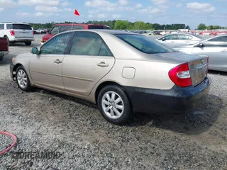 2004 Toyota Camry LE with VIN 4T1BF30K24U570599, listed as a IAAI auction lot 42107715 with 324,191 mi miles and . Bid and sale history available at DreamBid. Image 3.