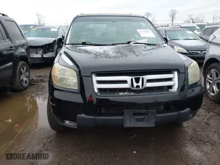 2007 Honda Pilot EX-L with VIN 5FNYF28557B028997, listed as a IAAI auction lot 41742267 with 217,114 mi miles. Bid and sale history available at carsss.com. Image 13.
