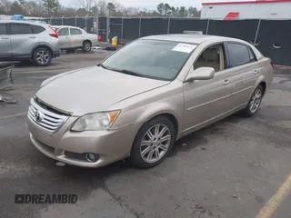 2008 Toyota Avalon XL with VIN 4T1BK36BX8U261553, listed as a IAAI auction lot 41382471 with 148,013 mi miles and . Bid and sale history available at carsss.com. Image 2.