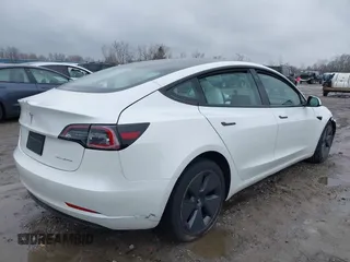 2022 Tesla Model 3 Long Range with VIN 5YJ3E1EB6NF272009, listed as a IAAI auction lot 41984154 with 12,651 mi miles and . Bid and sale history available at DreamBid. Image 4.