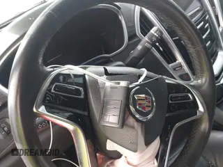2013 Cadillac SRX z VIN 3GYFNAE3XDS654498, wystawiony jako IAAI lot #41740938 z przebiegiem 134 933 mil mil oraz . Historia ofert i sprzedaży dostępna na DreamBid. Obrazek 11.