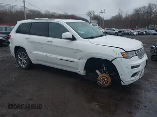 2020 Jeep Grand Cherokee Summit with VIN 1C4RJFJG0LC235505, listed as a IAAI auction lot 42020520 with 61,624 mi miles and . Bid and sale history available at DreamBid. Image 1.