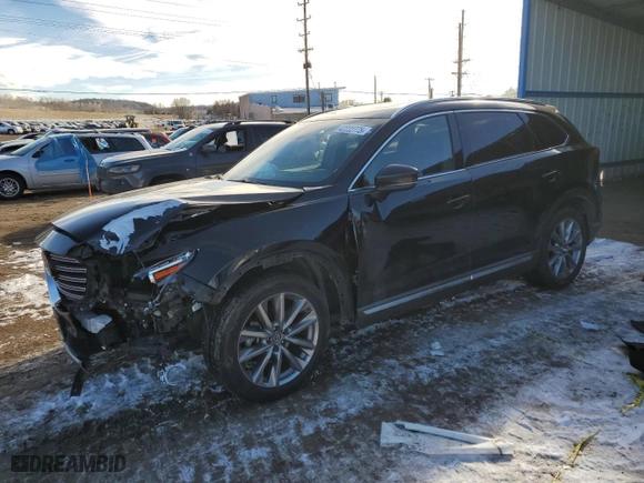 2021 Mazda CX-9 Grand Touring with VIN JM3TCADY9M0513562, listed as a Copart auction lot 42222775 with 105,717 mi miles and Salvage Title. Bid and sale history available at carsss.com. Image 1.
