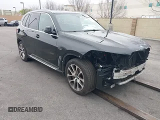 2022 BMW X5 xDrive45e with VIN 5UXTA6C08N9K85766, listed as a IAAI auction lot 41461039 with 95,003 mi miles. Bid and sale history available at carsss.com. Image 1.