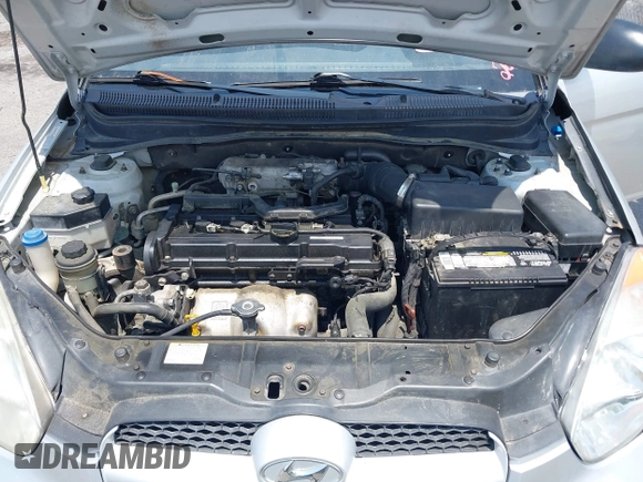 2008 Hyundai Accent GS z VIN KMHCM36C98U066163, wystawiony jako IAAI lot #42410152 z przebiegiem 196 656 mil mil oraz . Historia ofert i sprzedaży dostępna na DreamBid. Obrazek 10.