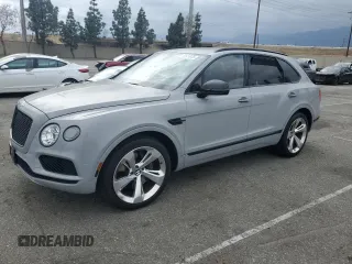 2017 Bentley Bentayga W12 z VIN SJAAC2ZV0HC015387, wystawiony jako Copart lot #53551835 z przebiegiem 38 573 mil mil oraz Szkody całkowita. Historia ofert i sprzedaży dostępna na DreamBid. Obrazek 1.