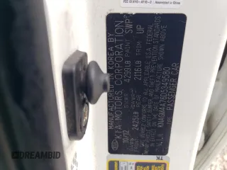 2013 Kia Optima LX z VIN KNAGM4A76D5349580, wystawiony jako Copart lot #43400545 z przebiegiem 156 241 mil mil oraz Szkoda całkowita • Salvage title. Historia ofert i sprzedaży dostępna na DreamBid. Obrazek 12.
