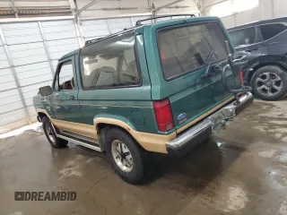 1987 Ford Bronco z VIN 1FMCU14T8HUA51662, wystawiony jako Copart lot #74972024 z przebiegiem 26 362 mil mil oraz Szkoda całkowita • Salvage title. Historia ofert i sprzedaży dostępna na DreamBid. Obrazek 2.
