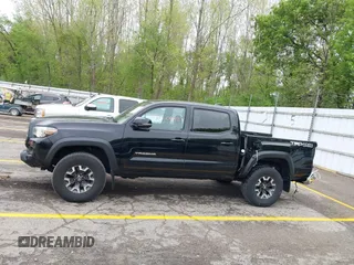 2021 Toyota Tacoma SR with VIN 3TMCZ5AN0MM417261, listed as a IAAI auction lot 42240693 with 38,625 mi miles and . Bid and sale history available at DreamBid. Image 15.