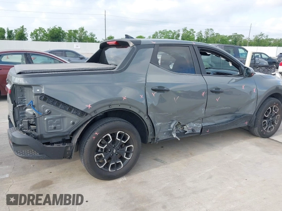 2022 Hyundai Santa Cruz SEL with VIN 5NTJBDAE4NH022823, listed as a IAAI auction lot 42051616 with 23,158 mi miles and . Bid and sale history available at DreamBid. Image 6.