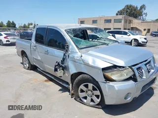 2007 Nissan Titan XE with VIN 1N6AA07A57N200866, listed as a IAAI auction lot 42563440 with 193,188 mi miles and . Bid and sale history available at DreamBid. Image 6.