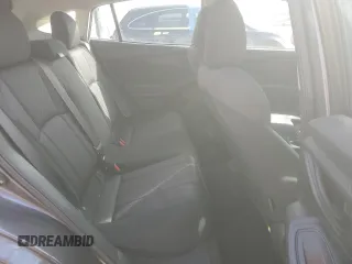2018 Subaru Impreza Premium z VIN 4S3GTAB6XJ3744007, wystawiony jako Copart lot #52596475 z przebiegiem 82 559 mil mil oraz Szkoda całkowita • Salvage title. Historia ofert i sprzedaży dostępna na DreamBid. Obrazek 11.