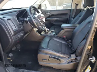 2015 GMC Canyon 4WD SLE with VIN 1GTG6BE38F1141624, listed as a Copart auction lot 42427975 with 193,511 mi miles and Salvage Title. Bid and sale history available at carsss.com. Image 7.