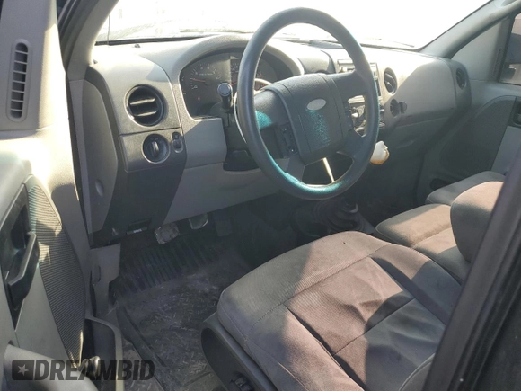 2005 Ford F-150 XL with VIN 1FTRF12235NC10435, listed as a Copart auction lot 57311935 with 249,847 mi miles and Salvage title. Bid and sale history available at DreamBid. Image 8.