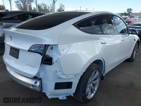2024 Tesla Model Y Long Range with VIN 7SAYGDEE5RA222333, listed as a IAAI auction lot 41944404 with 12,176 mi miles. Bid and sale history available at carsss.com. Image 4.