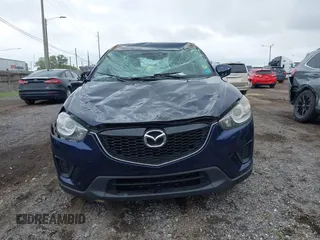 2013 Mazda CX-5 Sport with VIN JM3KE2BE1D0160254, listed as a IAAI auction lot 42256555 with 136,476 mi miles and . Bid and sale history available at DreamBid. Image 12.