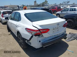 2018 Toyota Camry LE with VIN 4T1B11HK5JU007856, listed as a IAAI auction lot 42531732 with 121,020 mi miles and . Bid and sale history available at DreamBid. Image 3.
