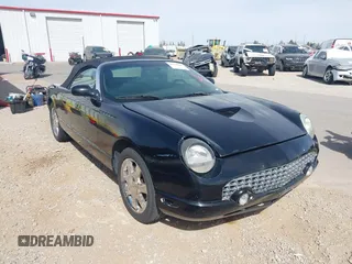 2002 Ford Thunderbird w/Hardtop Premium with VIN 1FAHP60A72Y129115, listed as a IAAI auction lot 41768100 with 54,393 mi miles. Bid and sale history available at carsss.com. Image 13.