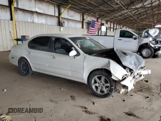 2001 Nissan Maxima GXE with VIN JN1CA31D41T809212, listed as a Copart auction lot 57845405 with 244,502 mi miles and Salvage title. Bid and sale history available at DreamBid. Image 4.
