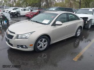 2011 Chevrolet Cruze LT w/2LT with VIN 1G1PG5S91B7233195, listed as a IAAI auction lot 42053649 with 177,877 mi miles. Bid and sale history available at carsss.com. Image 2.