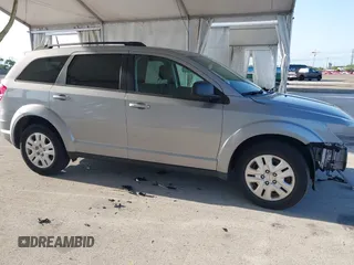 2020 Dodge Journey SE Value with VIN 3C4PDCAB7LT261203, listed as a IAAI auction lot 41963451 with 69,612 mi miles and . Bid and sale history available at carsss.com. Image 14.