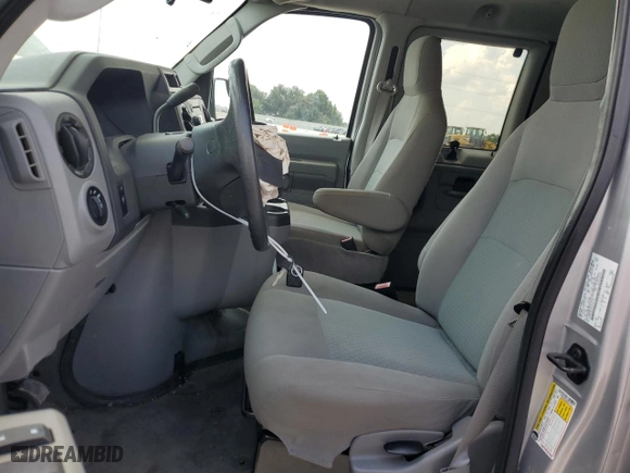 2014 Ford Econoline Wagon XL with VIN 1FBNE3BL0EDA47792, listed as a Copart auction lot 66011154 with 66,753 mi miles and Salvage Title. Bid and sale history available at carsss.com. Image 7.