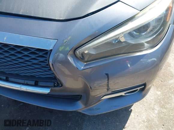 2014 Infiniti Q50 Sport with VIN JN1BV7AR4EM689009, listed as a IAAI auction lot 41990992 with 131,071 mi miles and . Bid and sale history available at DreamBid. Image 6.