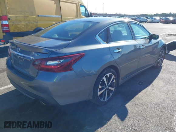 2017 Nissan Altima SR with VIN 1N4AL3AP1HC489534, listed as a IAAI auction lot 41811710 with 84,756 mi miles and . Bid and sale history available at carsss.com. Image 4.