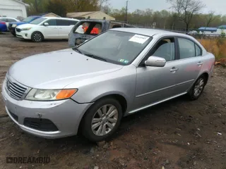 2010 Kia Optima LX with VIN KNAGG4A8XA5414877, listed as a IAAI auction lot 41929987 with 138,279 mi miles. Bid and sale history available at carsss.com. Image 2.