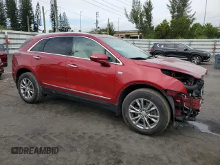 2021 Cadillac XT5 FWD Premium Luxury with VIN 1GYKNCRS7MZ149310, listed as a Copart auction lot 87937445 with 13,829 mi miles and Salvage Title. Bid and sale history available at DreamBid. Image 4.