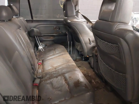 2005 Honda Pilot EX-L with VIN 5FNYF18635B056717, listed as a IAAI auction lot 42197100 with 80,400 mi miles and . Bid and sale history available at DreamBid. Image 8.