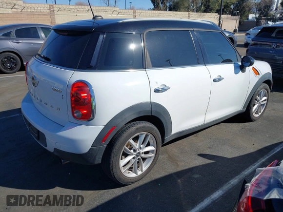 2014 MINI Countryman with VIN WMWZB3C53EWR39767, listed as a IAAI auction lot 41592112 with 129,403 mi miles and . Bid and sale history available at DreamBid. Image 4.