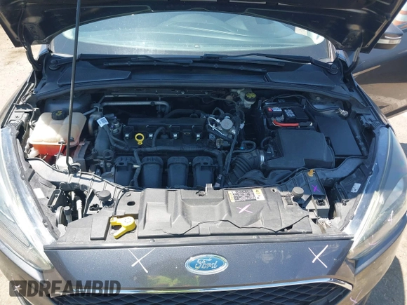 2016 Ford Focus SE z VIN 1FADP3F25GL329217, wystawiony jako IAAI lot #42461772 z przebiegiem 85 070 mil mil oraz . Historia ofert i sprzedaży dostępna na DreamBid. Obrazek 10.