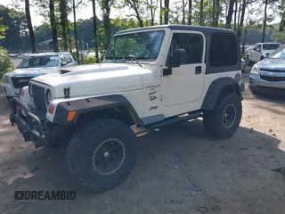 1999 Jeep Wrangler Sport with VIN 1J4FY19S1XP417362, listed as a IAAI auction lot 42738296 with 228,066 mi miles and . Bid and sale history available at DreamBid. Image 2.