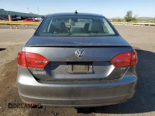 2014 Volkswagen Jetta TDI w/Premium z VIN 3VWLL7AJ8EM385667, wystawiony jako Copart lot #57804065 z przebiegiem 122 020 mil mil oraz Szkoda całkowita • Salvage title. Historia ofert i sprzedaży dostępna na DreamBid. Obrazek 6.