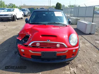 2006 MINI Convertible S with VIN WMWRH33596TK58563, listed as a IAAI auction lot 42210790 with 102,476 mi miles and . Bid and sale history available at DreamBid. Image 12.