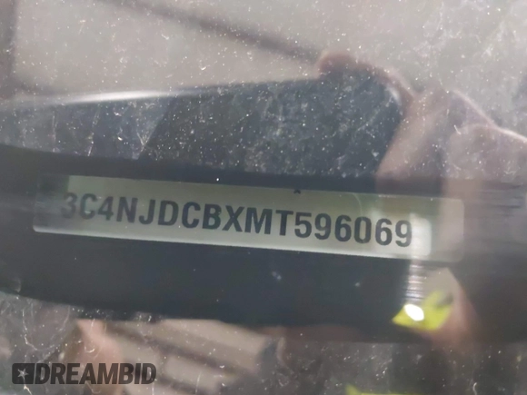 2021 Jeep Compass Limited with VIN 3C4NJDCBXMT596069, listed as a IAAI auction lot 42051527 with 120,236 mi miles and . Bid and sale history available at DreamBid. Image 9.