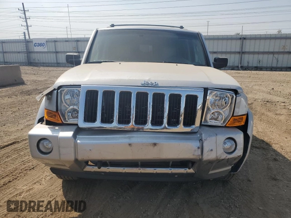 2007 Jeep Commander Limited with VIN 1J8HG58P87C595890, listed as a Copart auction lot 71123654 with 148,438 mi miles and Salvage Title. Bid and sale history available at carsss.com. Image 5.