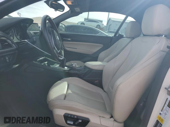 2016 BMW 2 Series 228i with VIN WBA1K9C52GV321798, listed as a Copart auction lot 45011725 with 56,673 mi miles and Salvage Title. Bid and sale history available at carsss.com. Image 7.
