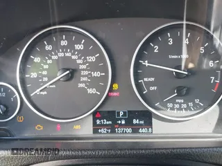 2014 BMW 3 Series 328i xDrive with VIN WBA3B3C56EJ981496, listed as a IAAI auction lot 41822862 with 137,700 mi miles. Bid and sale history available at carsss.com. Image 7.