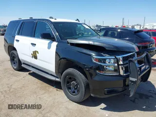 2017 Chevrolet Tahoe Commercial z VIN 1GNLCDEC2HR187691, wystawiony jako IAAI lot #40101169 z przebiegiem 87 772 mil mil oraz . Historia ofert i sprzedaży dostępna na DreamBid. Obrazek 1.