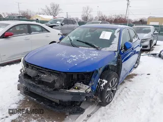 2023 Honda Civic Sedan EX with VIN 2HGFE1F76PH311090, listed as a IAAI auction lot 41245114 with 34,114 mi miles. Bid and sale history available at carsss.com. Image 6.