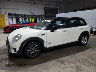 2017 MINI Clubman Cooper with VIN WMWLU1C57H2F27158, listed as a Copart auction lot 77672744 with 73,850 mi miles and Salvage Title. Bid and sale history available at carsss.com. Image 1.